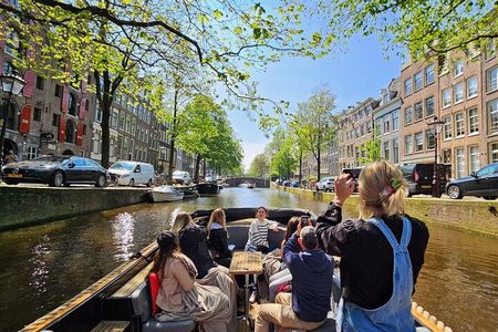 Amsterdam Canal Tour by Open Boat – 90 min Small Group Experience