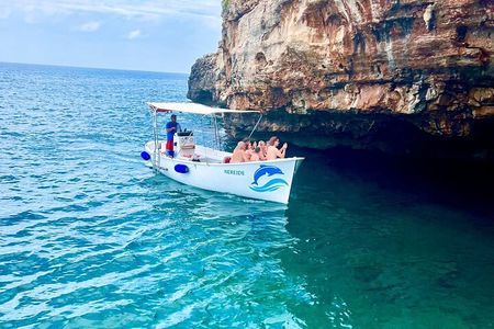By boat between the two Seas to discover the Caves of S.M. diLeuca