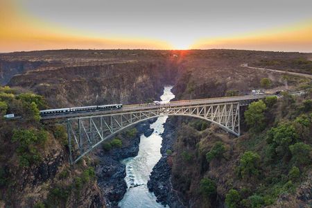 Luxury Train to Victoria Falls Scenic Bridge Ride and Gastronomy