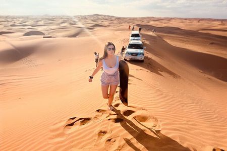 Dubai Red Dune Desert Safari BBQ Dinner, Camel Ride & Live Shows