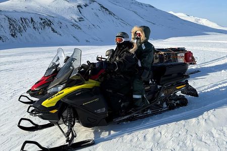 Svalbard Snowmobile Adventure and Ice Cave Exploration
