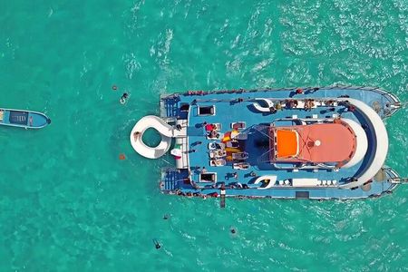 Cancun Dancer Catamaran Cruise with Snorkeling and Lunch