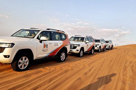 Dubai Desert Safari: Dune Bashing, Camel Ride, BBQ Dinner.