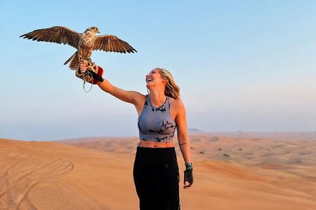Private Red Dune Safari with BBQ, Camel Ride & Traditional Shows