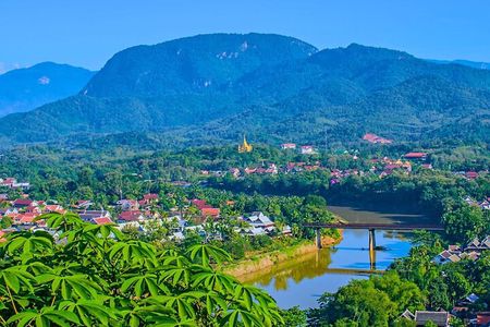 Luang Prabang Alm Giving, Temples and Pak Ou Caves Private Tour