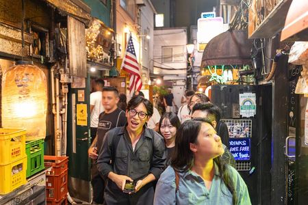 Tokyo Night Tour: Izakaya Dinner & Karaoke with Free-Flow Drinks