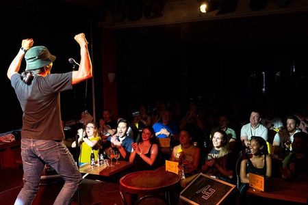 English Comedy Show with Pizza and Shots in Central Berlin
