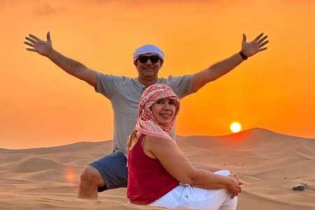 Sunset & sunrise Desert Safari with Sandboarding and Camel Ride