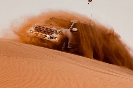 Dubai Desert Safari, ATV Bike, SandBoarding, Camel Ride & BBQ 