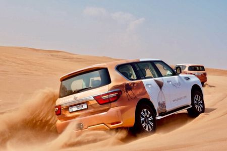 Dubai Red Dunes Safari with Dune Bashing, Camel Ride, BBQ Dinner