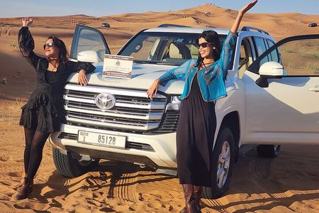 Morning Red Dunes Desert Safari With Camel Ride And Sand Boarding