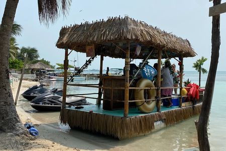Private Tiki Boat Adventure in Caye Caulker