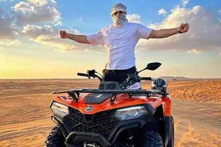 VIP Dubai Desert Safari with Quad Bike, Camel Ride, Dinner, Shows