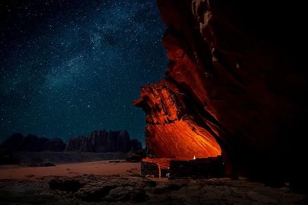 Wadi Rum Cave Camping with Afternoon/Sunset Camel Ride