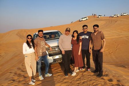 Dubai Desert Safari: Dune Adventure, Quad bike, Camel ride & BBQ