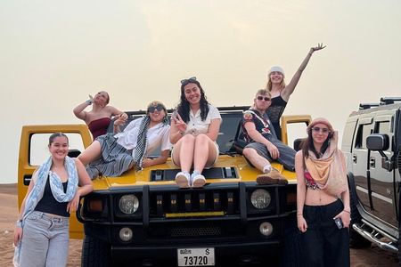 Dubai Half-Day Desert Tour: Camel Ride, Quad Bike & BBQ Dinner