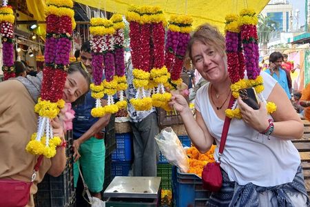 Mumbai Morning Tour —Train Ride, Market & Hidden Local Spots