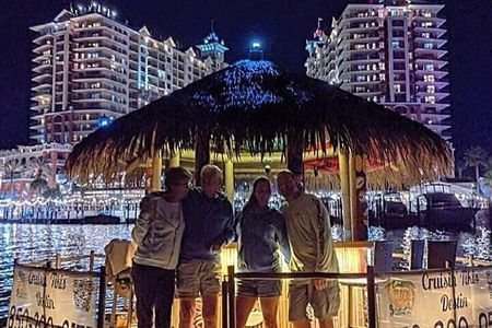 Original Destin Tikis Harbor Lights Cruise through Destin Harbor