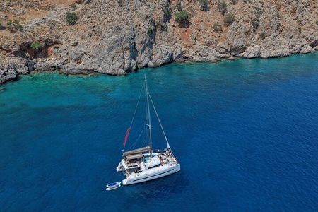 Panormo Luxury Catamaran - Gourmet Lunch, Hidden Coves & Swim