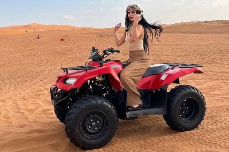 Dubai Quad Bike Evening Safari with BBQ Dinner & Camel Ride