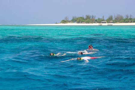 Zanzibar Scenic Stone Town Coastal Cruise and Snorkeling Trip