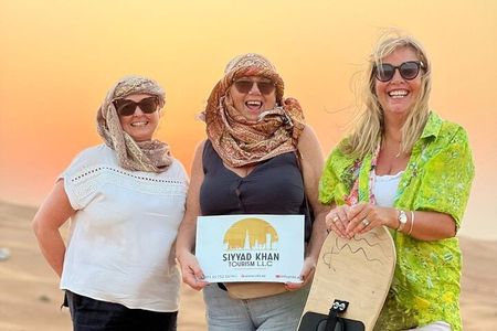 Morning Desert Safari - Dune Bashing Camel Ride & Sand Boarding 