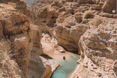 Wadi Shab Small Group Tour from Muscat | Guided Hiking Swimming