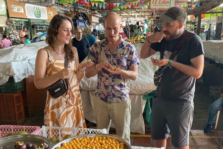 Food tour in Cali with exotic fruits, breads and drinks