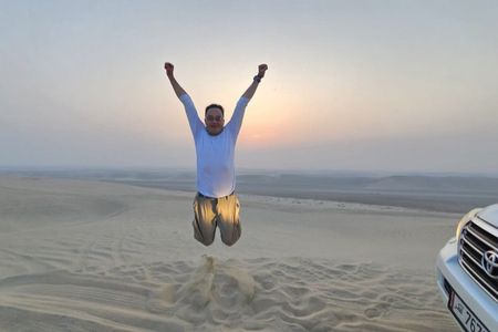 Doha airport layover transfer private desert safari camel ride