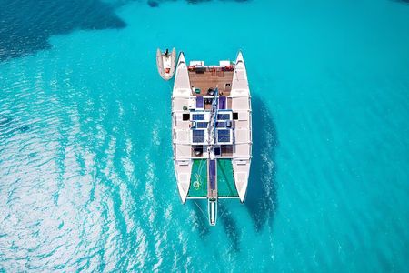 Zanzibar Mnemba Atoll Shared Catamaran and Snorkeling Cruise