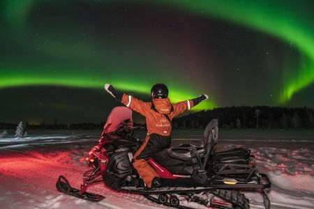 Northern Lights Tour Snowmobile Driving