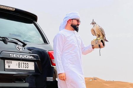 4 Hours Desert Safari Dune Bashing Camel Ride and Sand Boarding