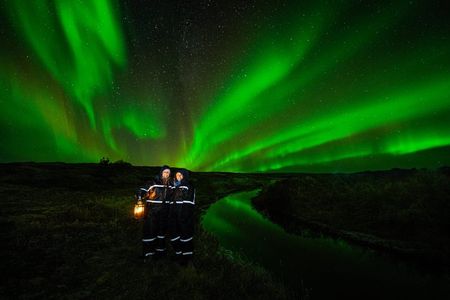Northern Lights Small-Group Tour with Photos, Snacks & Snowsuits