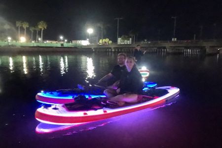 Nighttime iSUP Glow Paddleboard Adventure in Daytona Beach