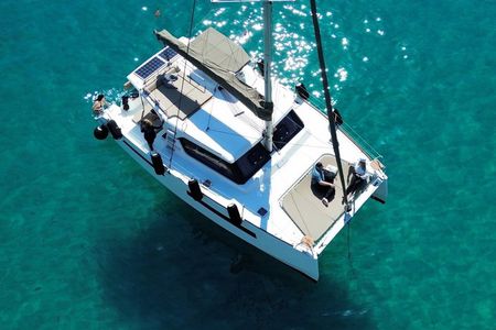 Catamaran tour stops bathing and snorkeling toast with prosecco