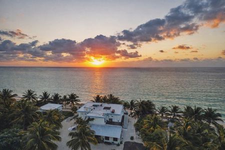 Private Beach Club Experience with Transport, Food & Drinks