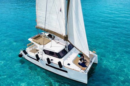 Catamaran tour stops bathing and snorkeling toast with prosecco