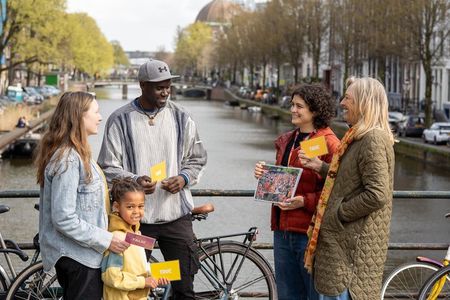 Private Amsterdam Family Walking Tour with Games and Pancakes
