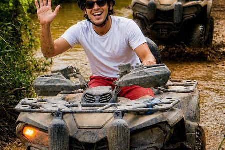 Single ATV Adventure + Pina Colada & Roundtrip Transportation