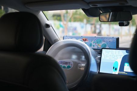 Guangzhou: Self-Driving Robotaxi Experience with Guide