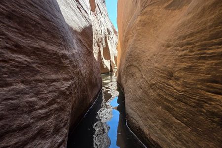 Remote Water-Filled Slot Canyon Adventure