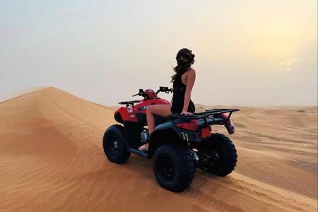 Doha : Quad Bike Desert Safari With Sandboarding & camel ride