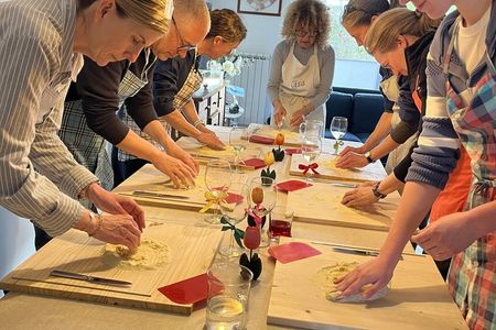 Make pasta, drink wine. Cooking class with transported included!