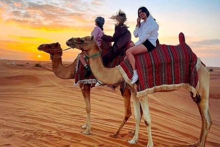 Sunset & sunrise Desert Safari with Sandboarding and Camel Ride