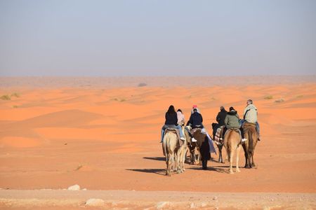 Camel Ride at Sunset & Overnight Stay in a Sahara Camp