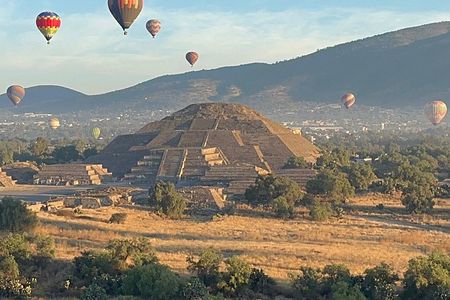 Balloon sunrise over Teotihuacan and Basilica pyramids