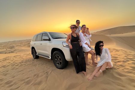 Evening Desert Safari Abu Dhabi Camel Ride & Sand Boarding
