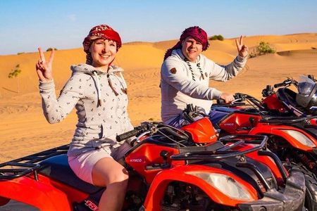 VIP Desert Safari Camel 30 Minutes Quad Bike BBQ Dinner Live Show