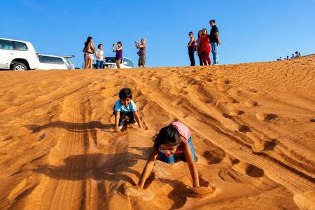 Premium Desert Safari with Quad Bike Red Dunes Camel Ride Dinner