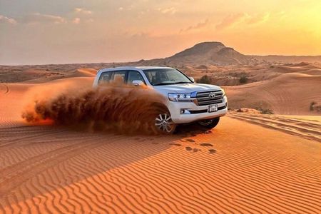Doha: Inland Sea Desert Safari with Camel Ride & Dune Bashing